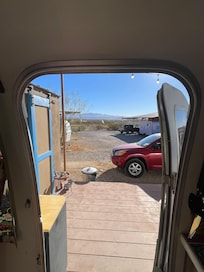 Front door of Pixie. See the house/building right in front of the deck.