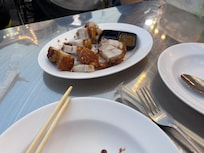 Banthat Thong Rd market and restaurants.