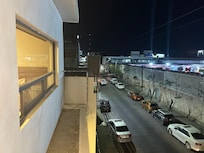 View of my room's (18) window overlooking bus station