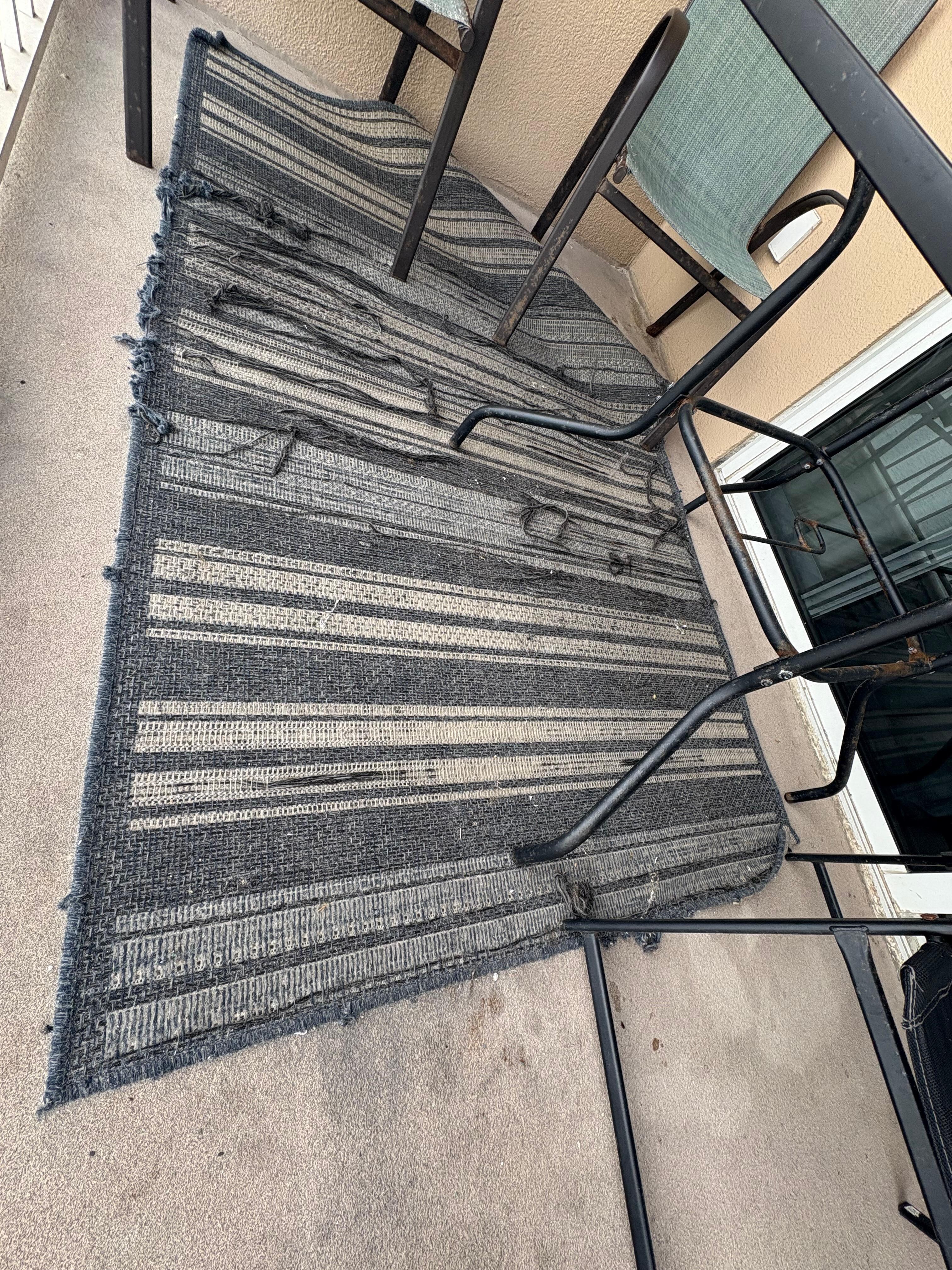 Balcony rug is raveled and disgusting