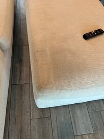 dirty ottoman in living room