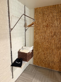 Fresh fluffy towels and places to hang clothes