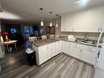 The kitchen was nice and had lots of space and seating for eating.