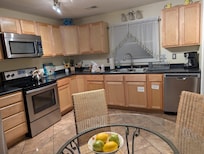 Plenty of room in the kitchen to cook and eat. Was nice not to have to eat out all the time.