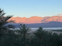 Looking out at the distant desert mountains