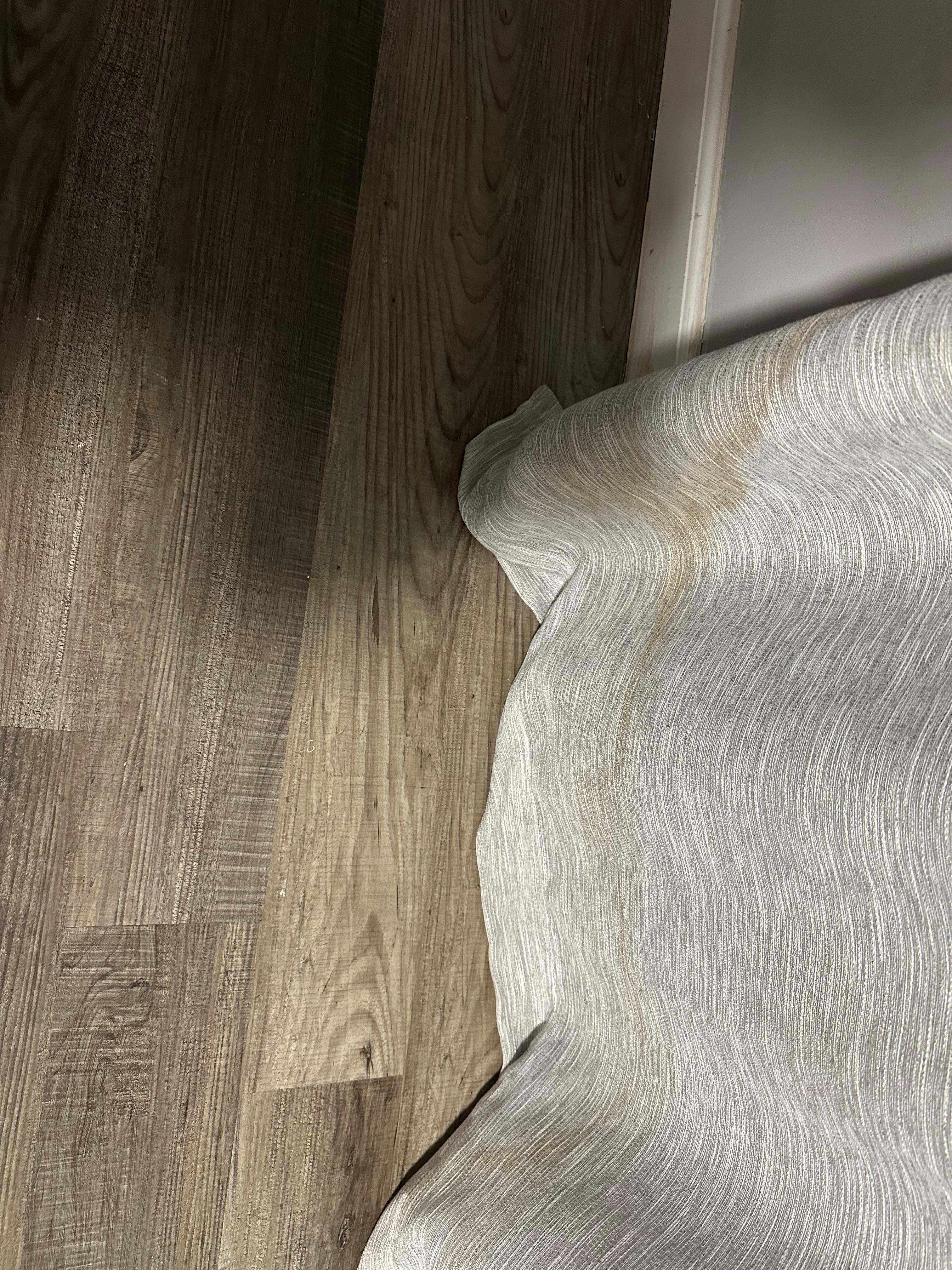 Staine md drapes from water leak.