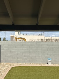 View of the barbed wire and Water Plant. Oh and some container of chlorine just left out.