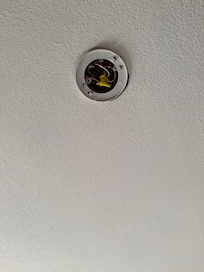 Where the smoke detector is supposed to be.