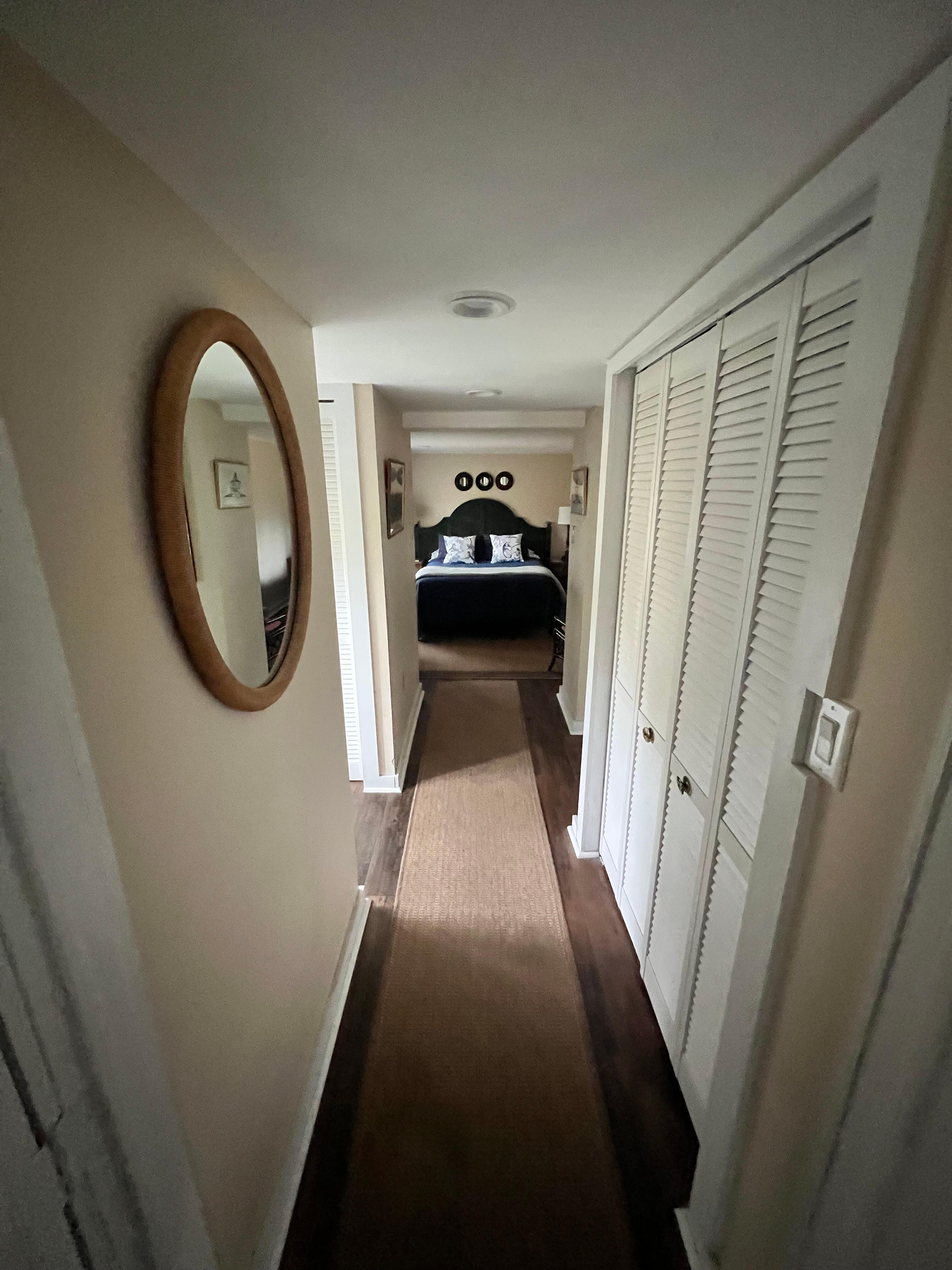 Downstairs hallway leading to bedroom