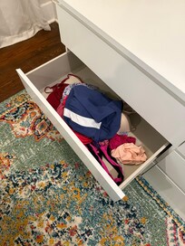 Either a tenant's clothing or former guest's clothing left behind.