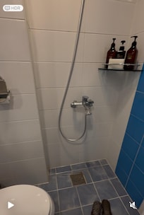 Great water pressure, but no curtain. Water ended up in front of the bed.