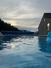 Enjoying the pool and the view from it too.