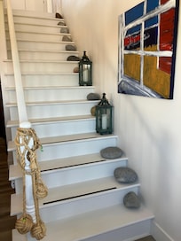 Stairs going upstairs to the bedrooms