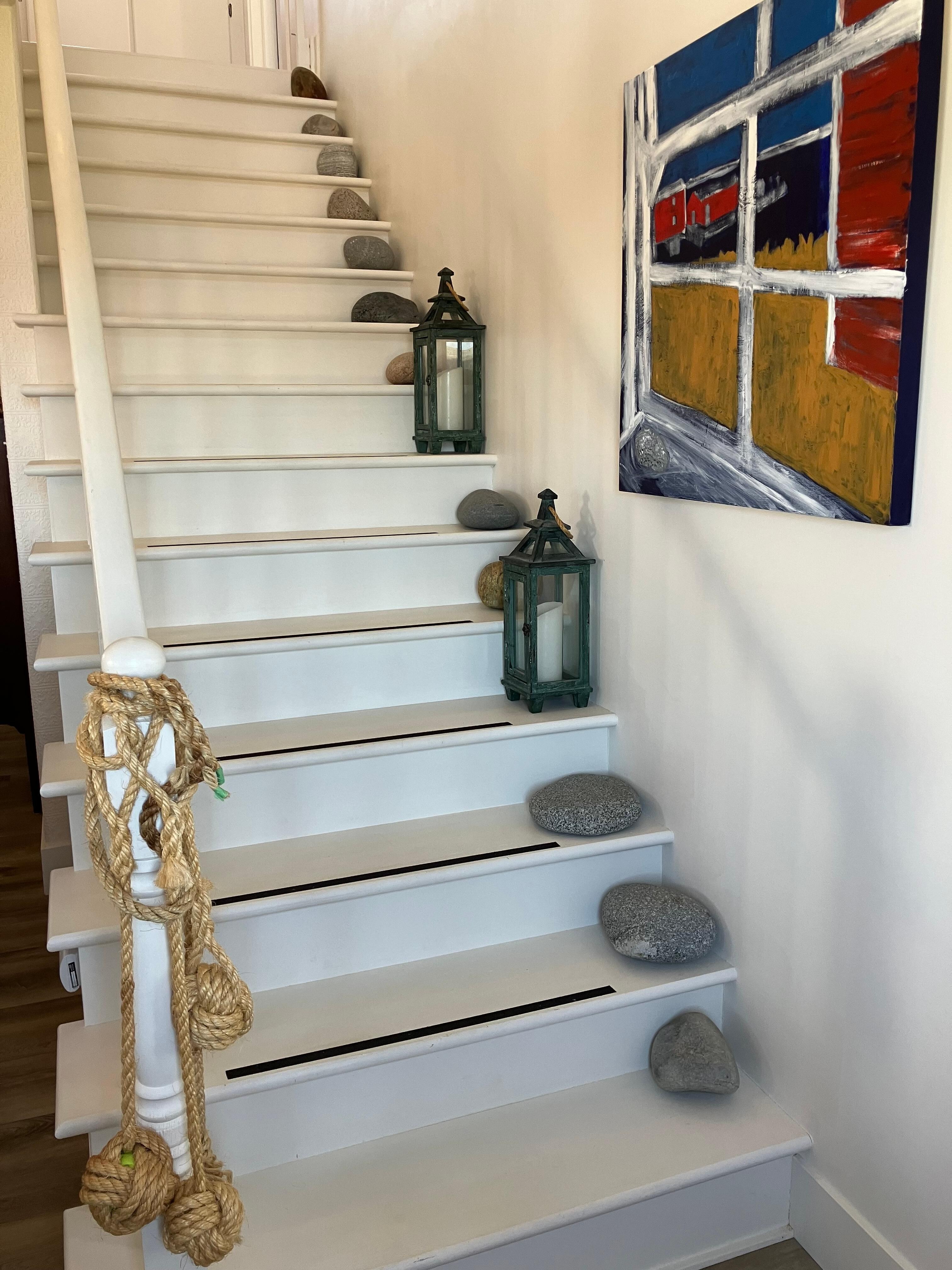 Stairs going upstairs to the bedrooms