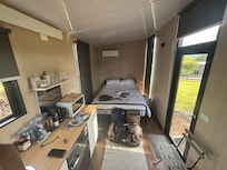 Comfy bed, a side lamp would be nice for reading.