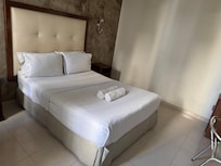 Bed was sloping toward the wall and it was only a twin bed. Room was only 10-10