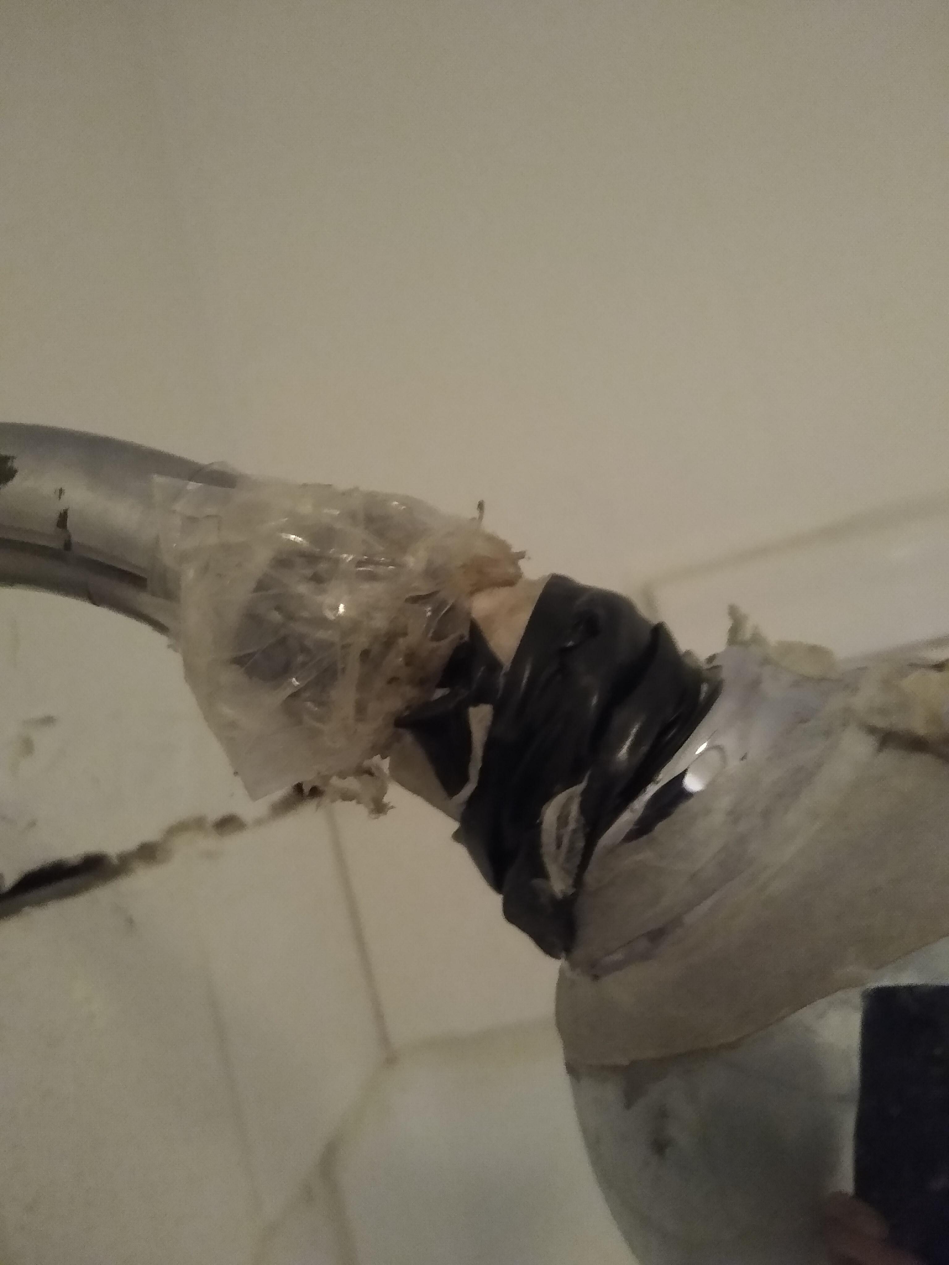 Repairing a leaking shower head.