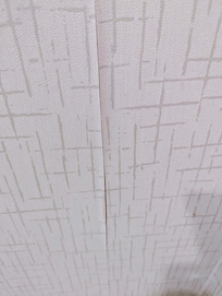 wallpaper starting to peel off