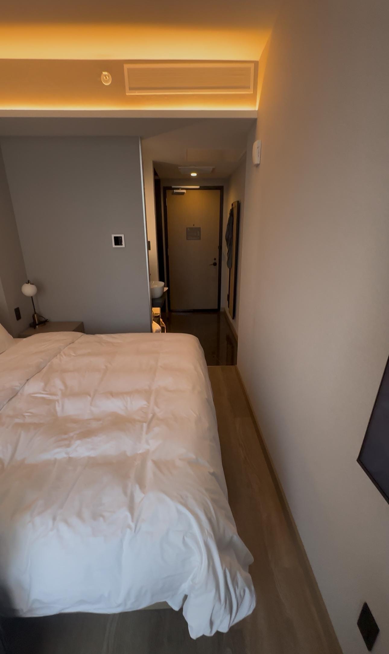 The narrow space I was talking about. You can see the TV had to be mounted in the awkward corner.