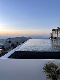 The infinity pool, and restaurant deck
