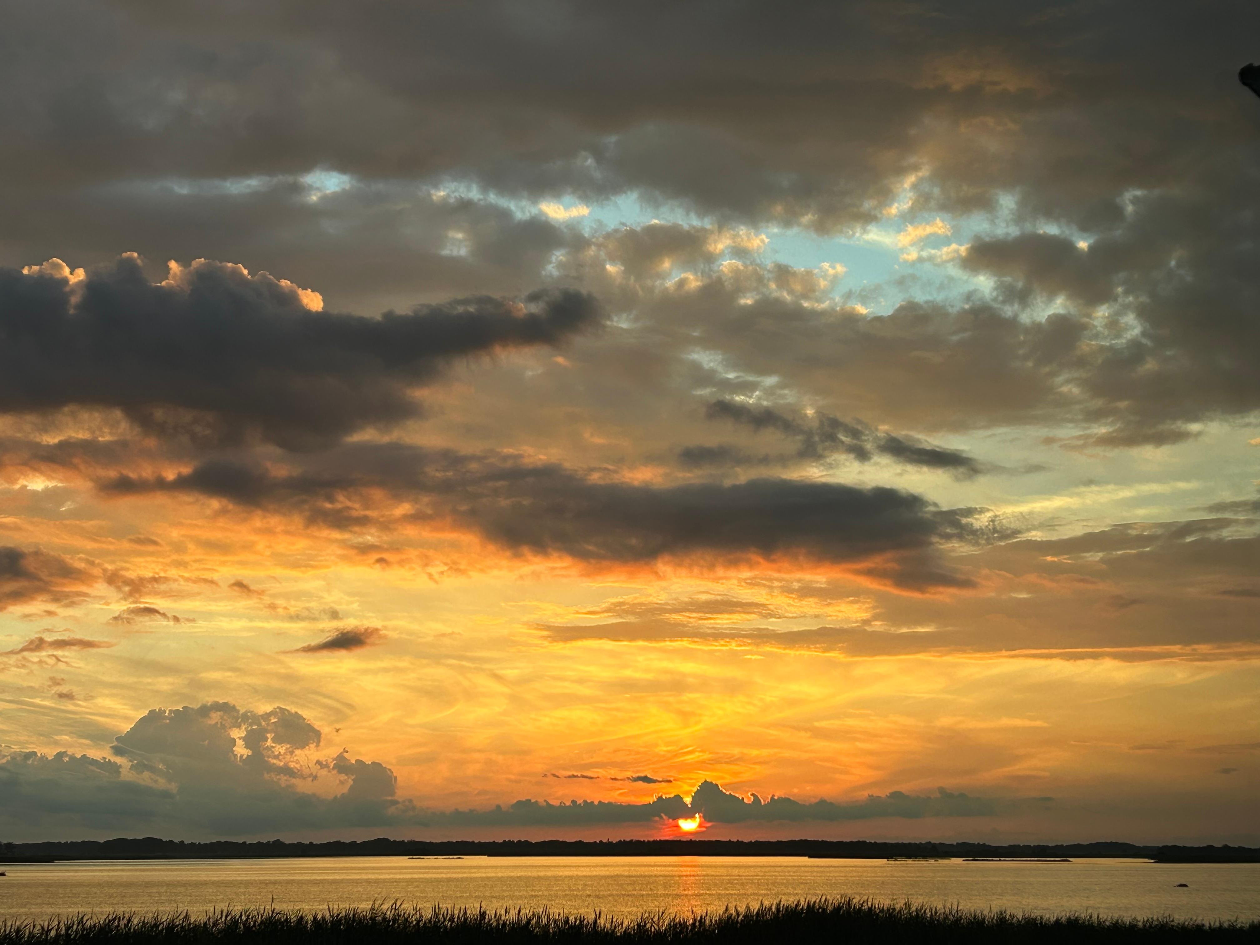 Sunset over the marsh from living room windows. 