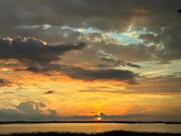 Sunset over the marsh from living room windows.