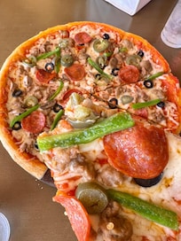 コースのレストランのピザ