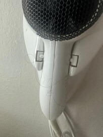 this is hair left on the hair-dryer