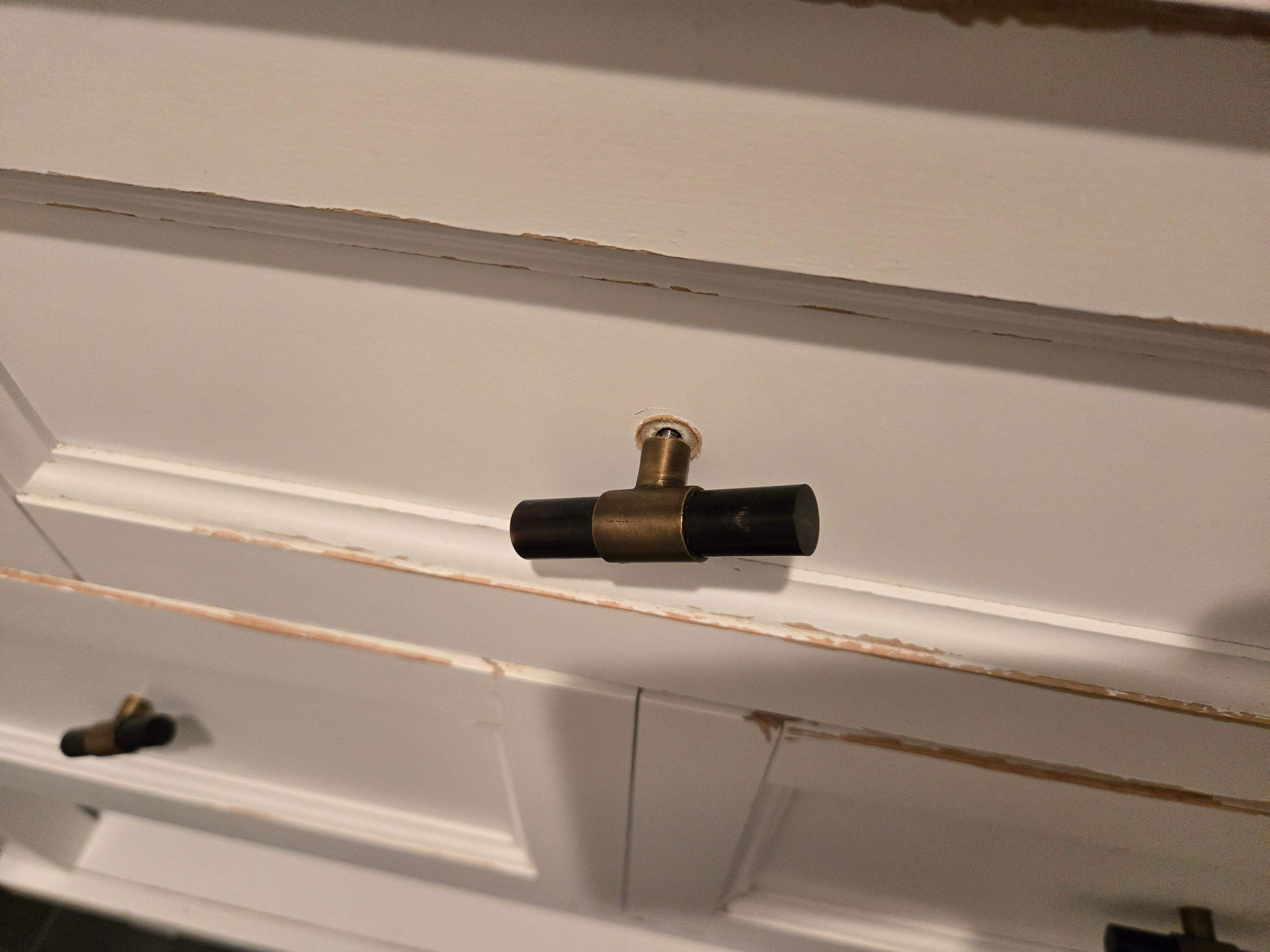 Handles were coming off several of the cabinets.