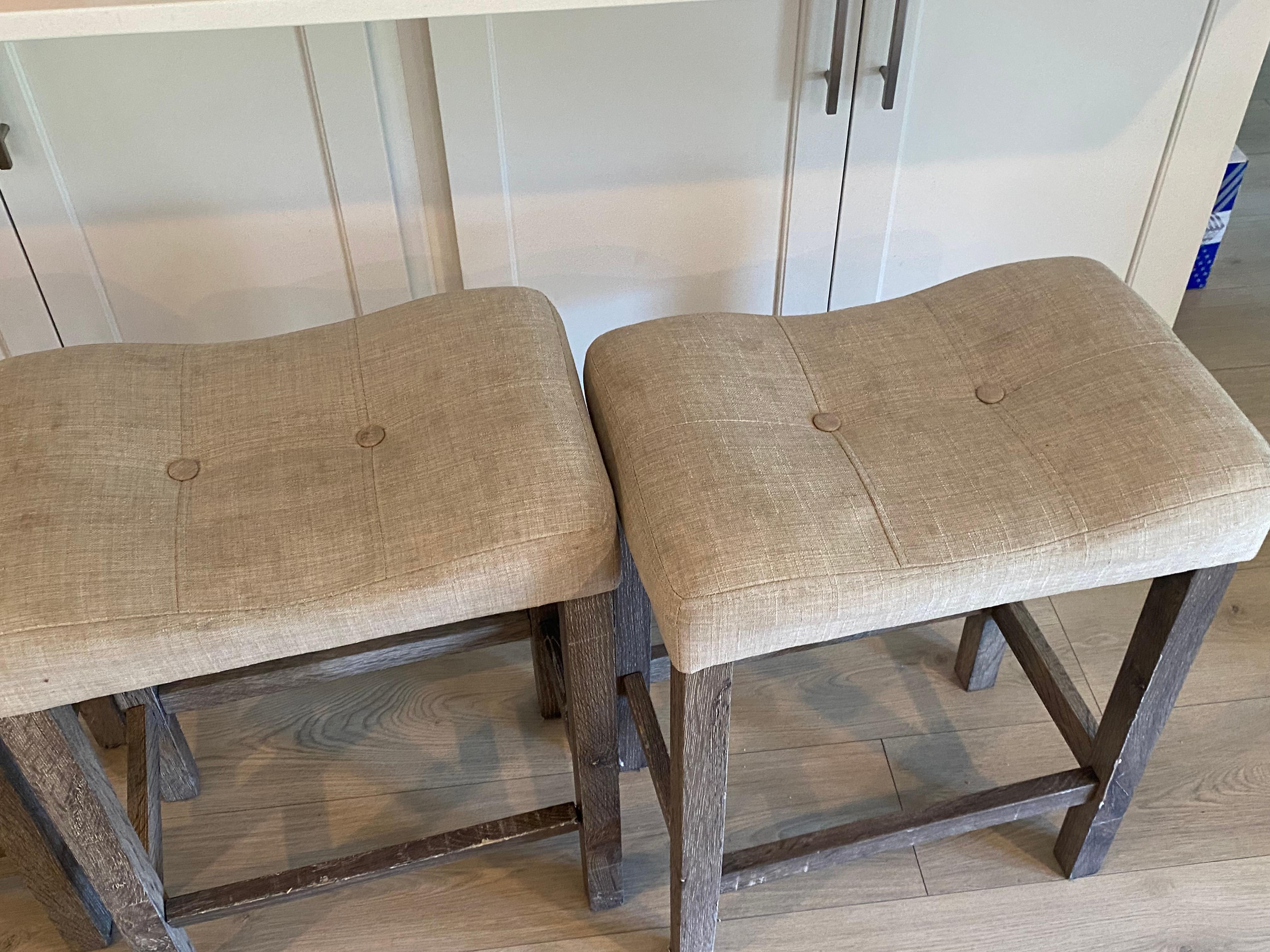 Stained and wobbly bar stools