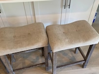 Stained and wobbly bar stools