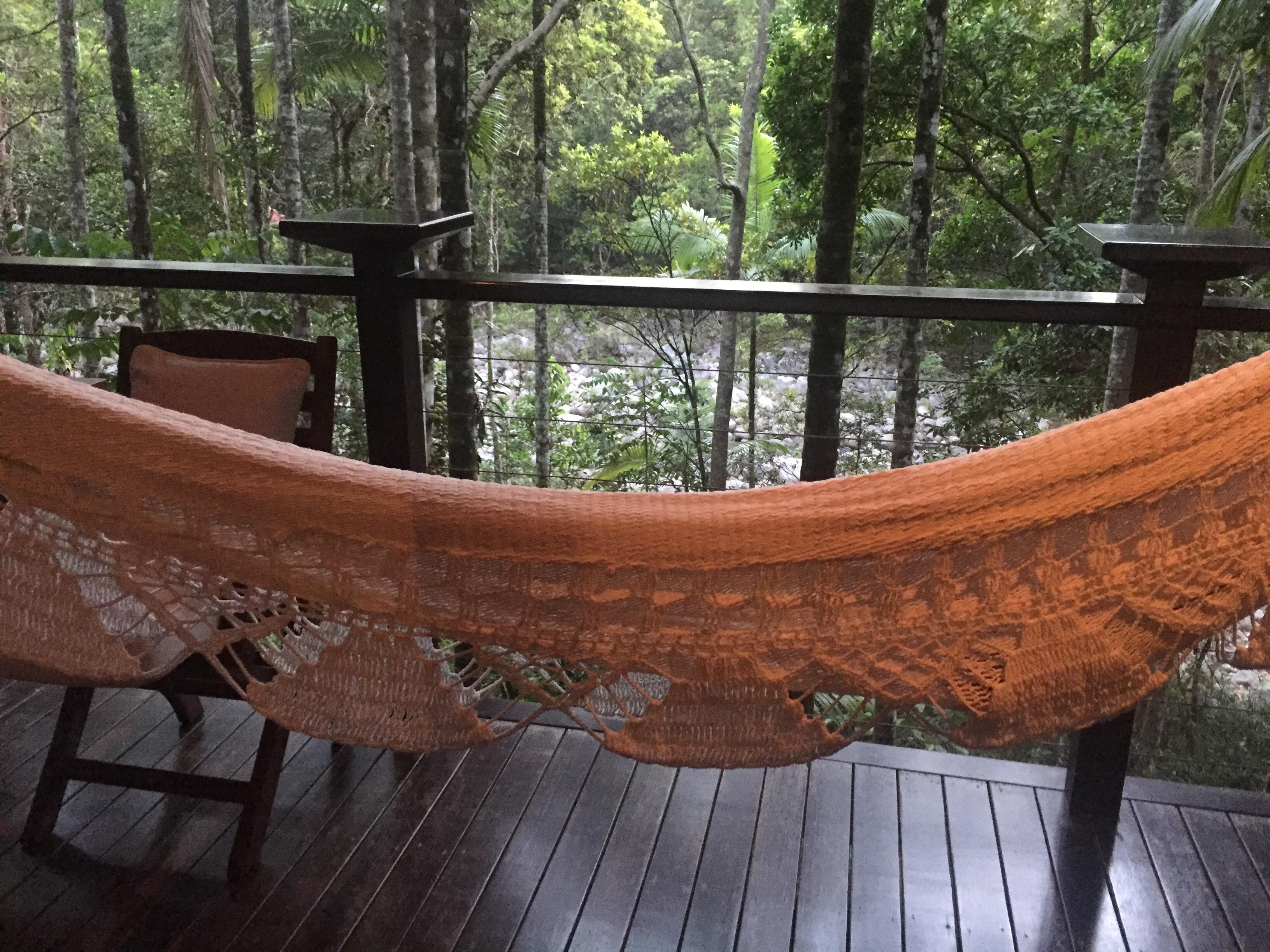 Room with a hammock and view