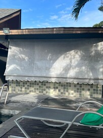 Closed and abandoned bar at villa pool