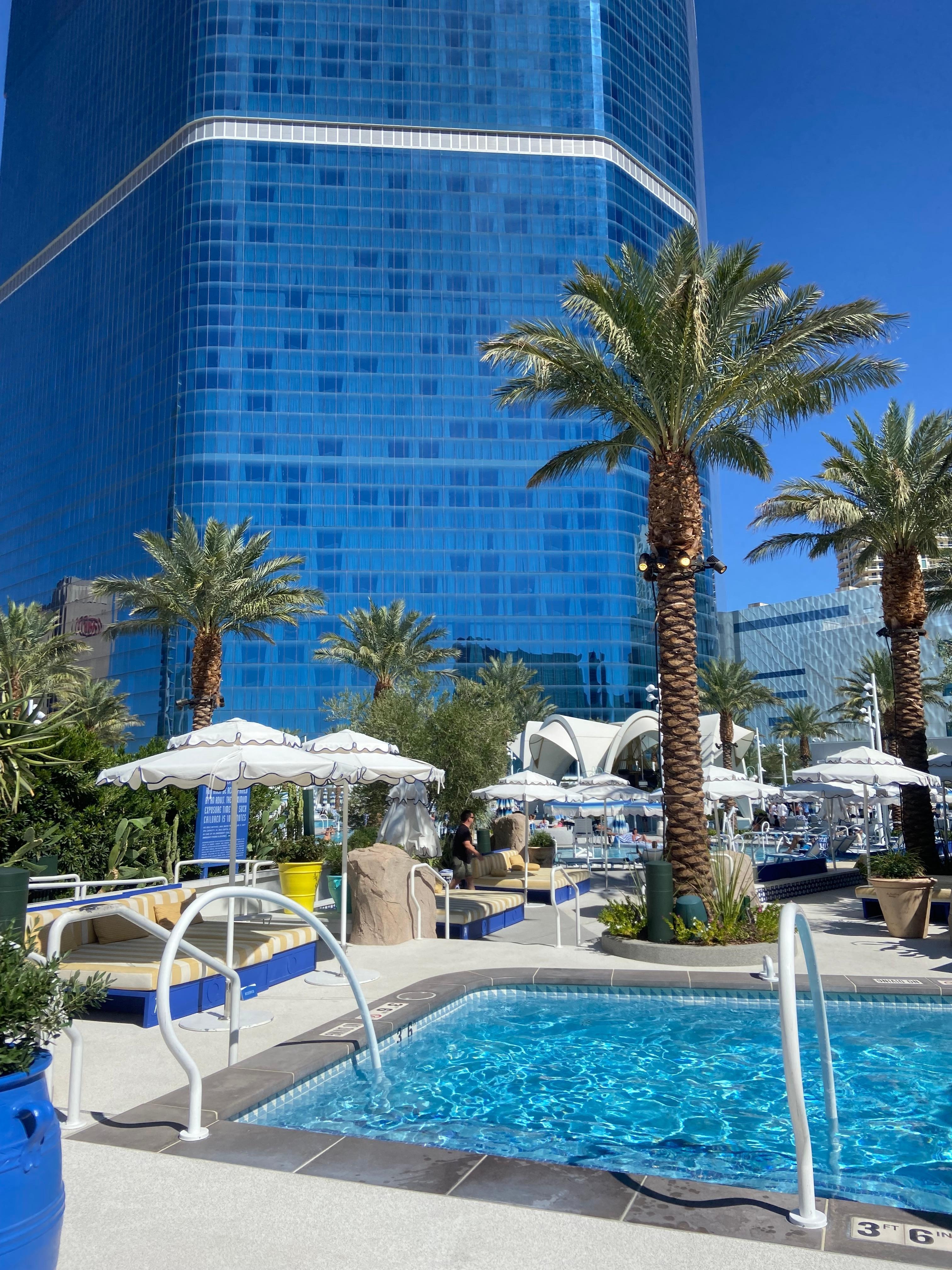 Pool area. Cabana rentals and day beds are overly priced and no one in them.