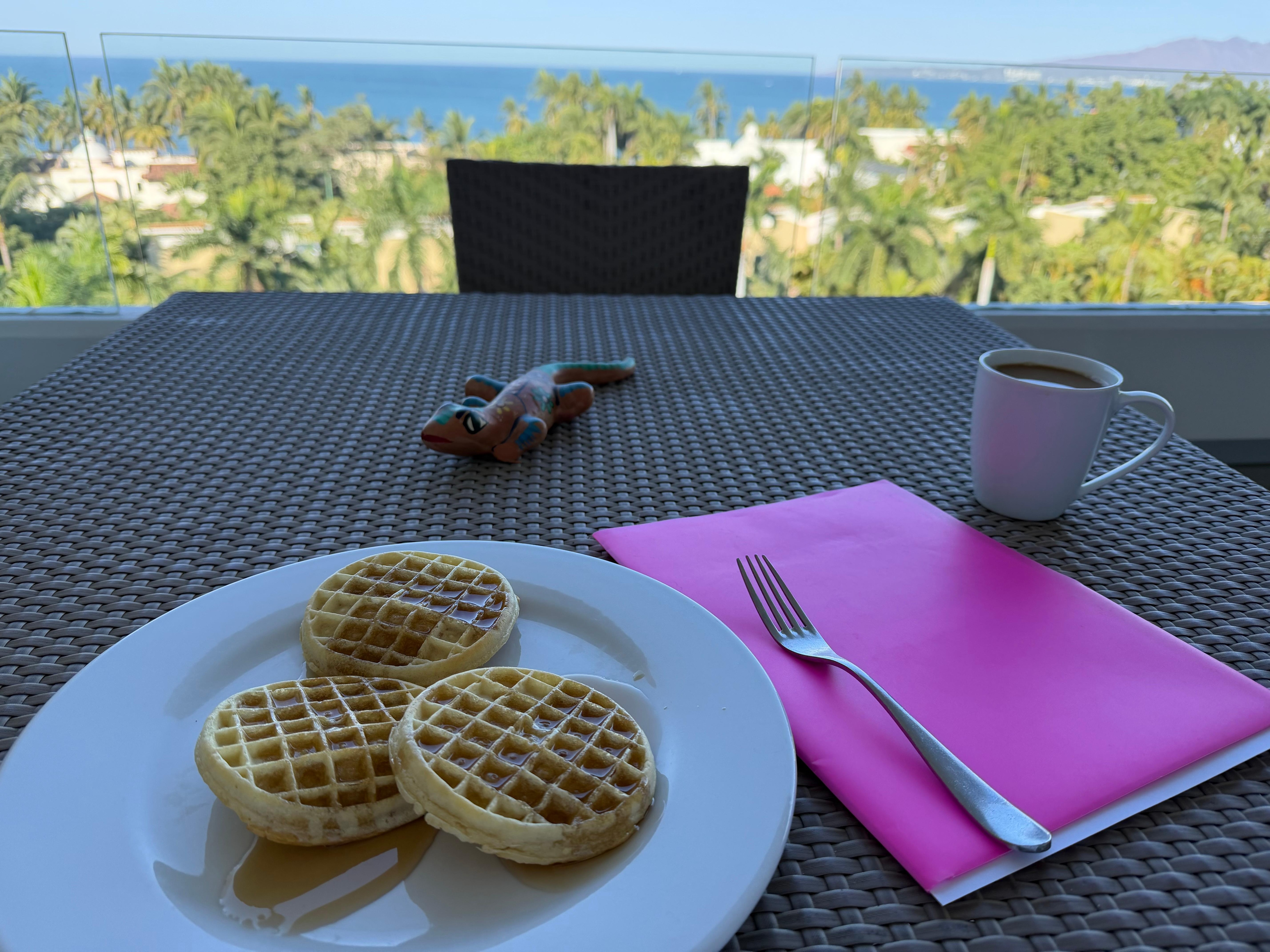 Breakfast on balcony dining table.