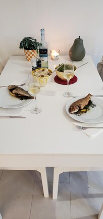 Enjoying a dinner inside.