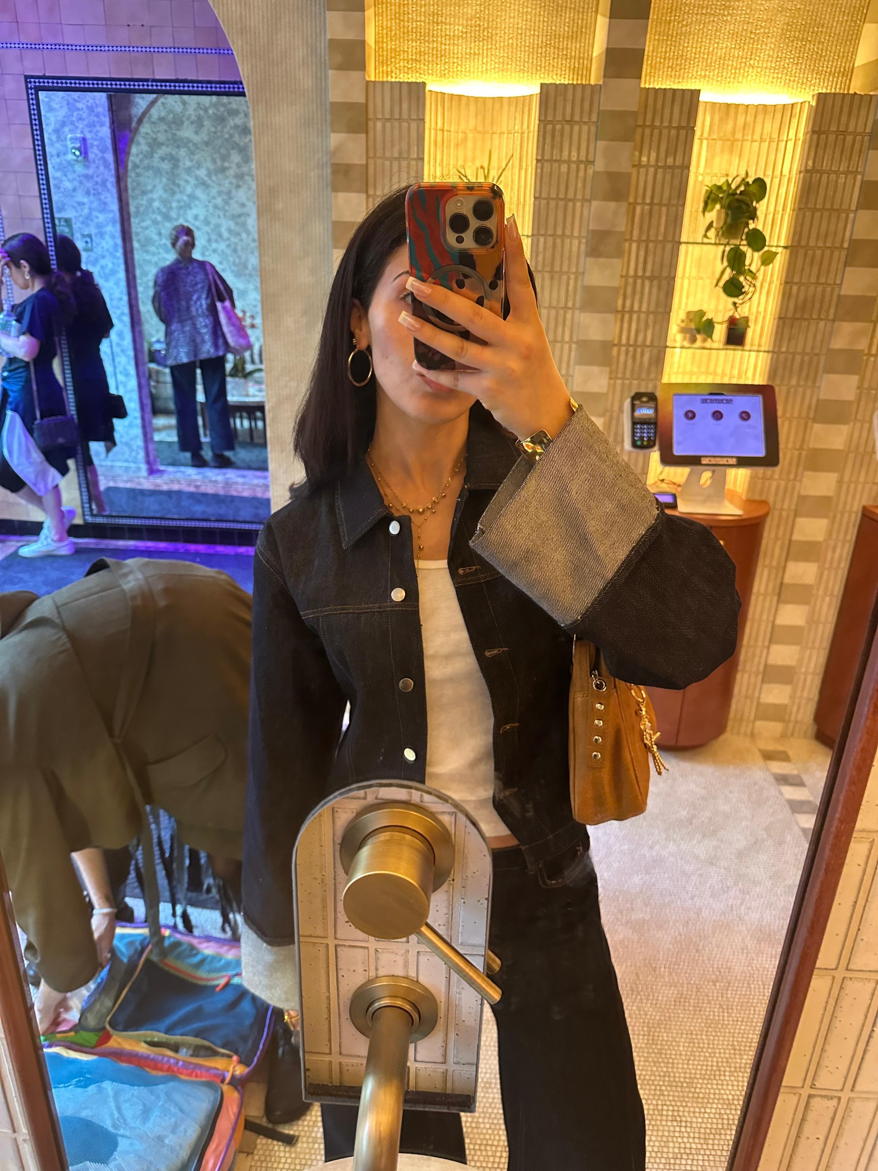 Lobby area mirror by front desk during the day