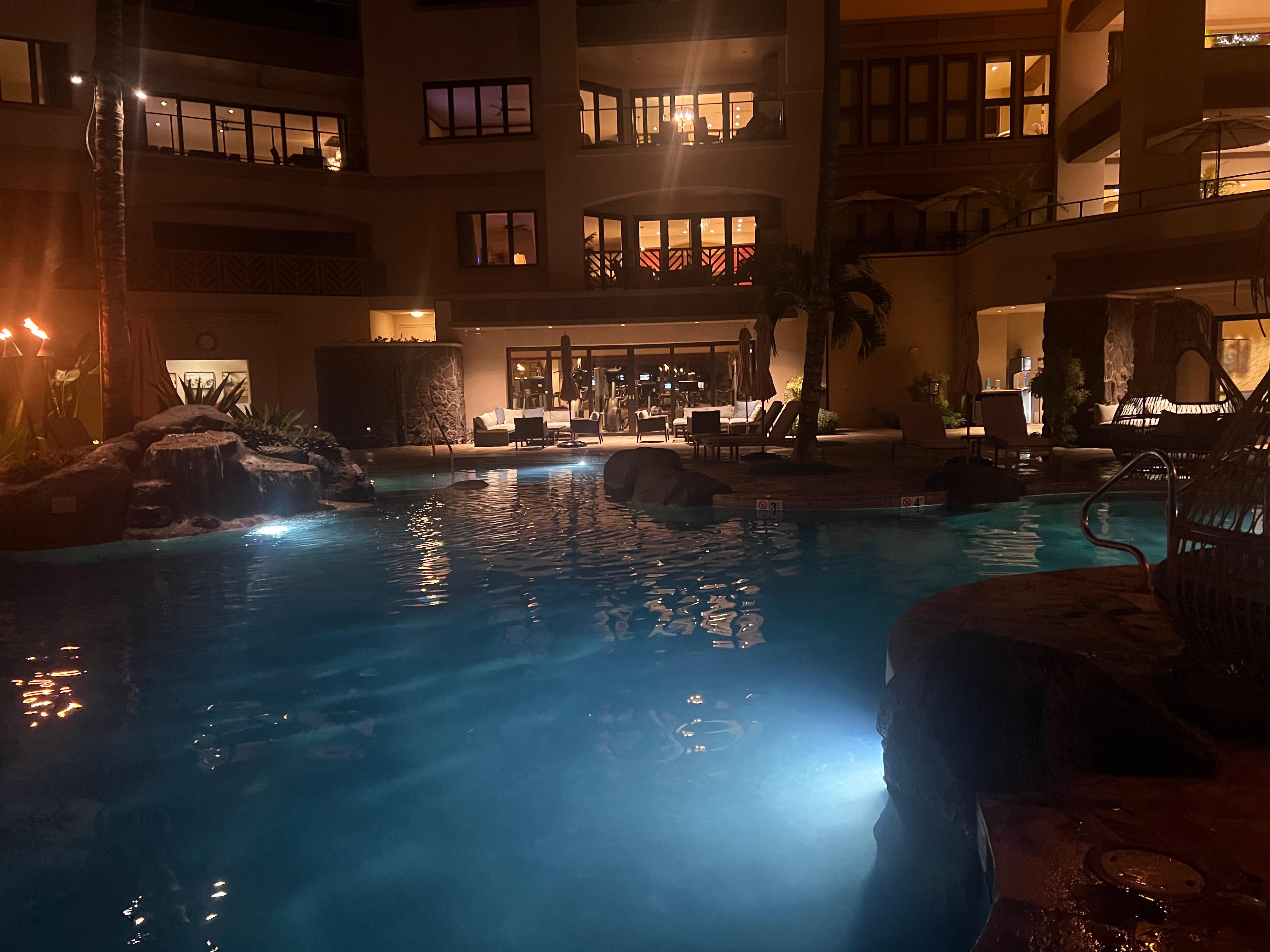 View of the family pool at night 