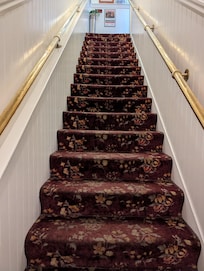 Stairs going up to get checked it.