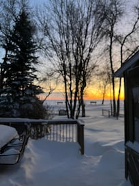 Sunrise over Lake Winnipeg on a chilly Manitoba winter.