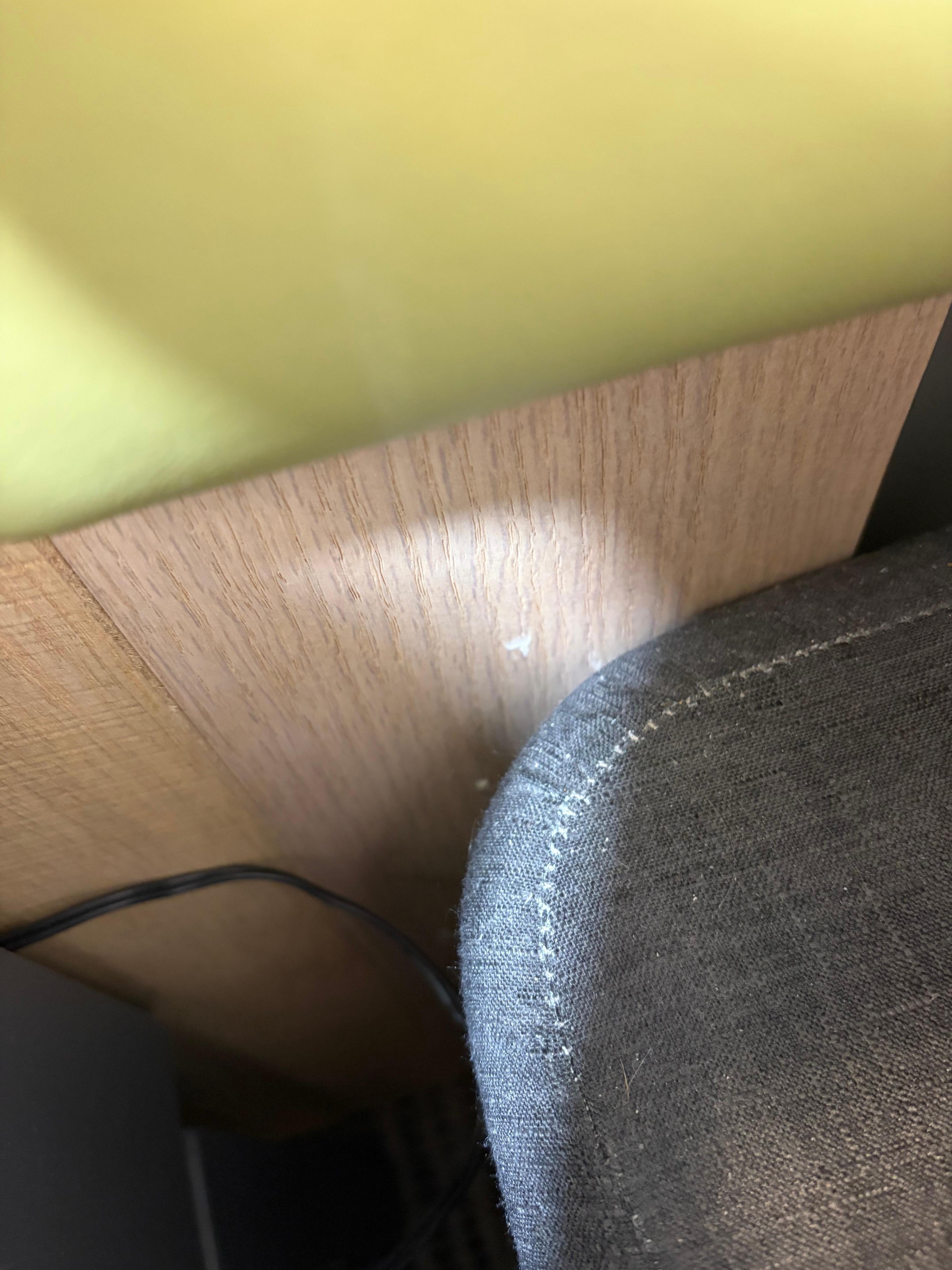 Goo behind bed on wall