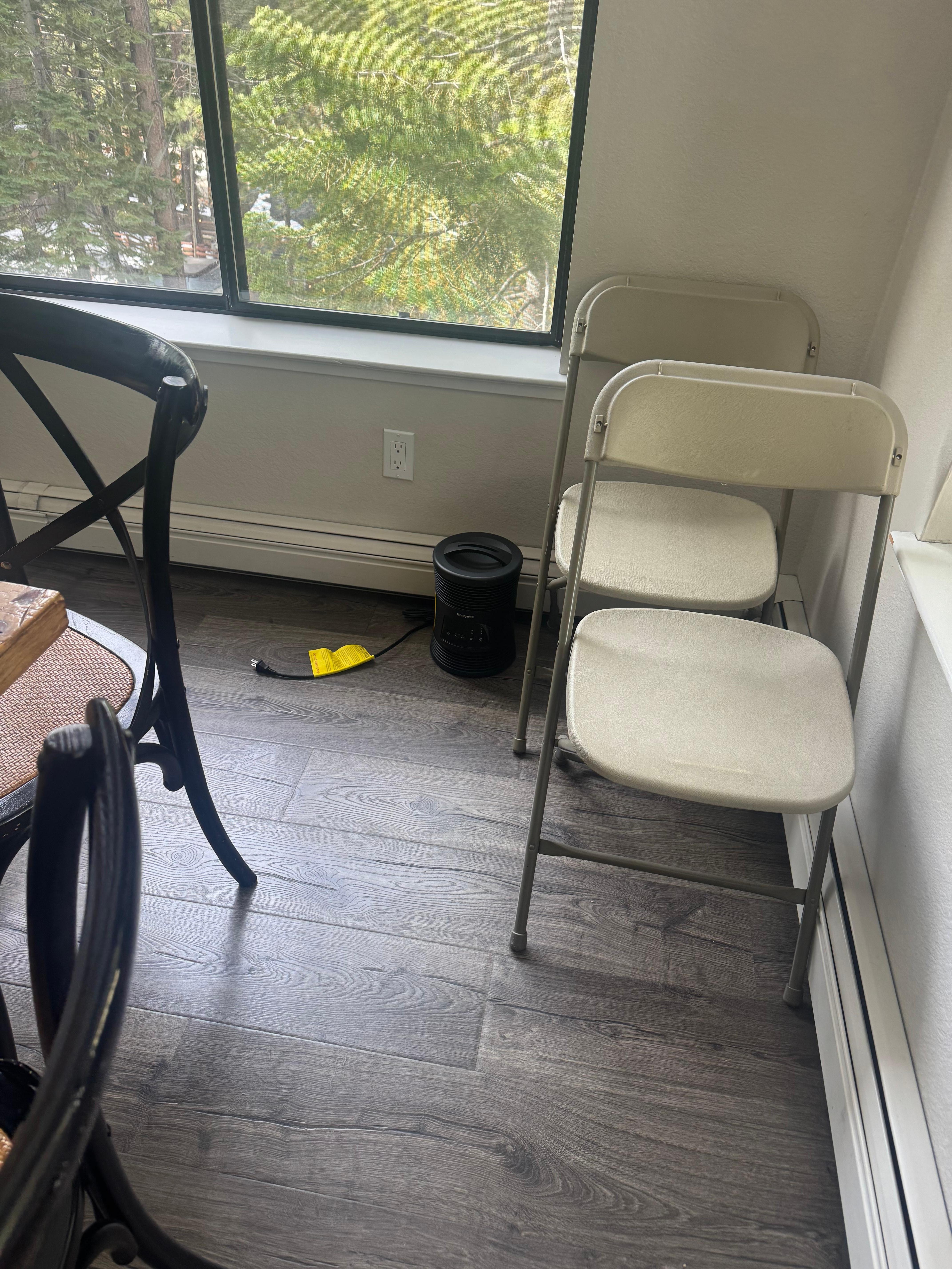 Personal heater in kitchen as substitute for main heater, which did not work on the main floor. 