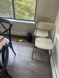 Personal heater in kitchen as substitute for main heater, which did not work on the main floor.