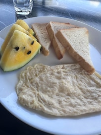 Breakfast served fresh with delicious fruits.