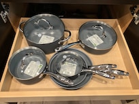 New pots and pans, silverware, plates and bowls, washer and dryer