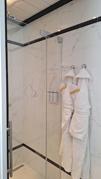 Lush bathrobes and slippers. They brought us chocolates, a bedside mat, and eye shades in the early evening.