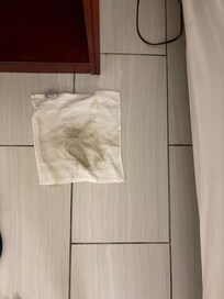 The towel that I wiped one foot off with
