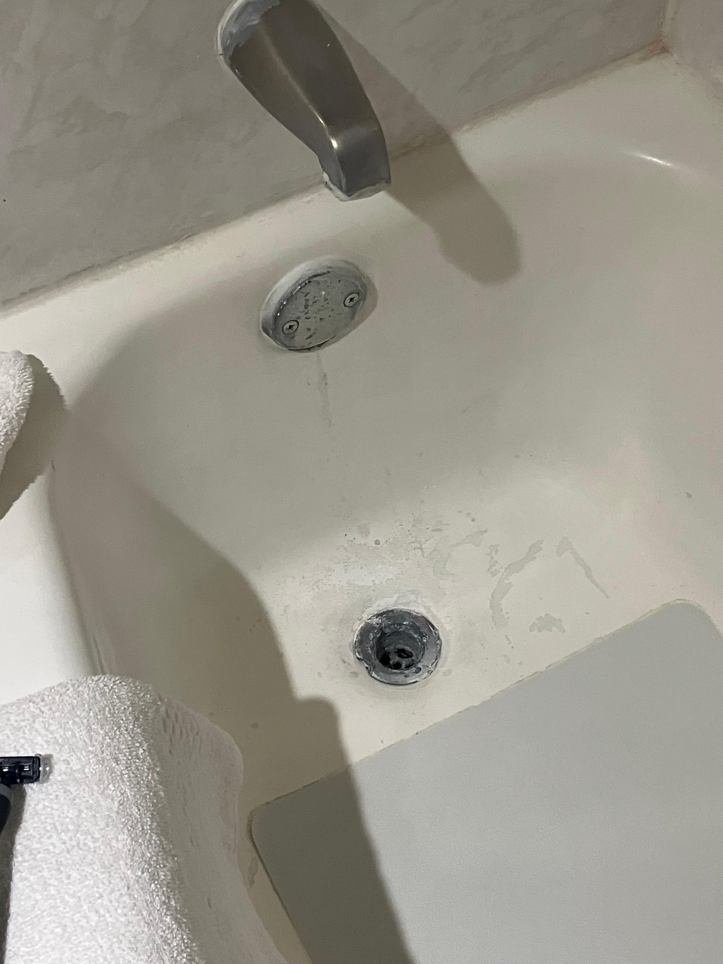 Look at this tub…who would feel comfortable taking a bath or shower in this!