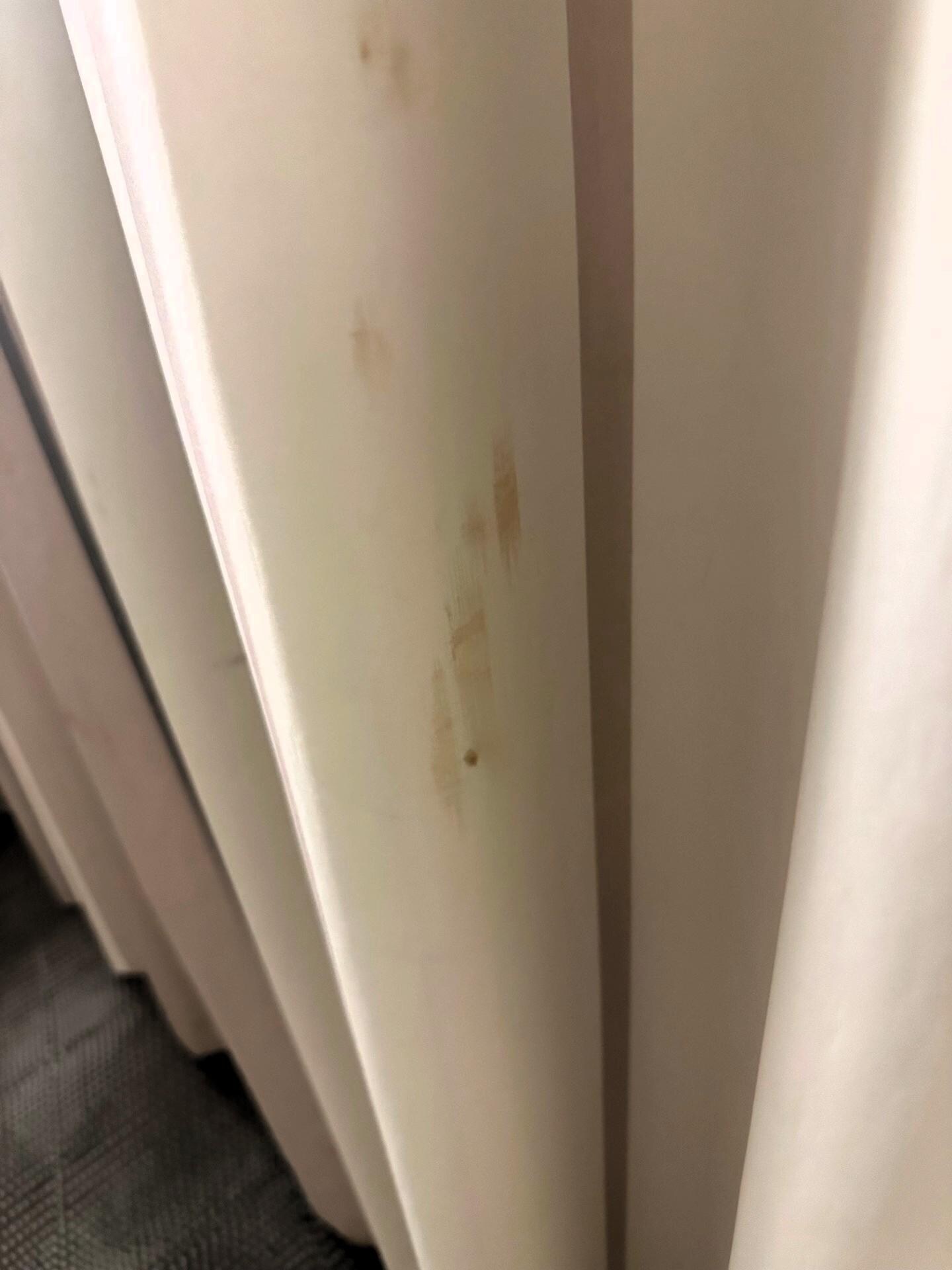 Lovely plastic curtains complete with stains