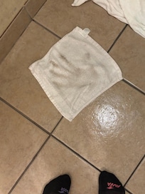 Towel after drying bathroom floor.
